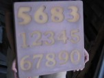 rubber-numbers-in-stone-befS.jpg